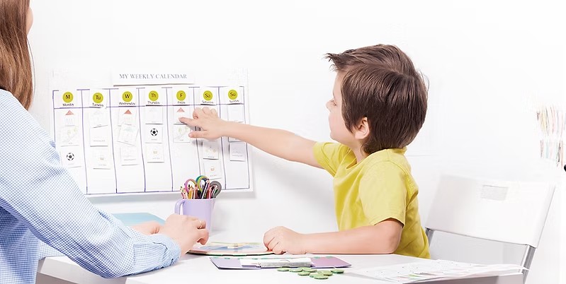 Parent and child reviewing a schedule during an assessment process