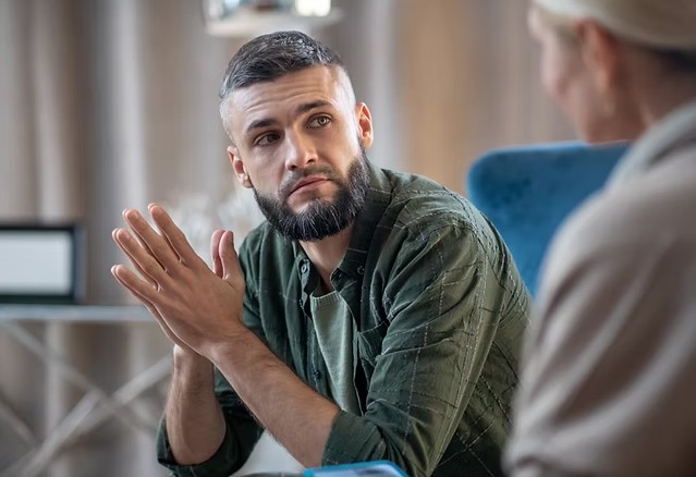 Client speaking with a clinician